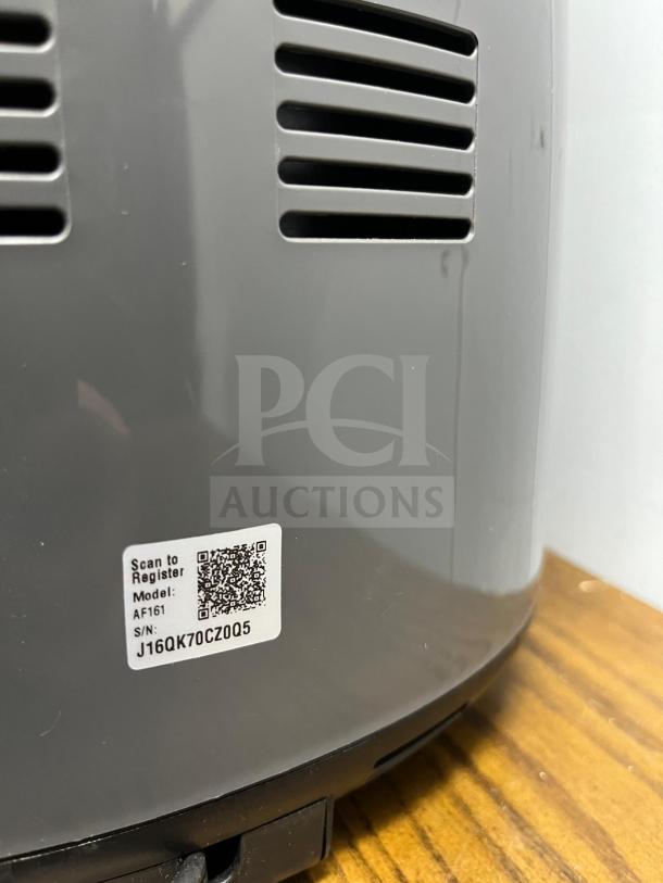 Ninja AF161 Air Fryer Max XL, model AF161, with registration QR code, gray finish, in good condition.