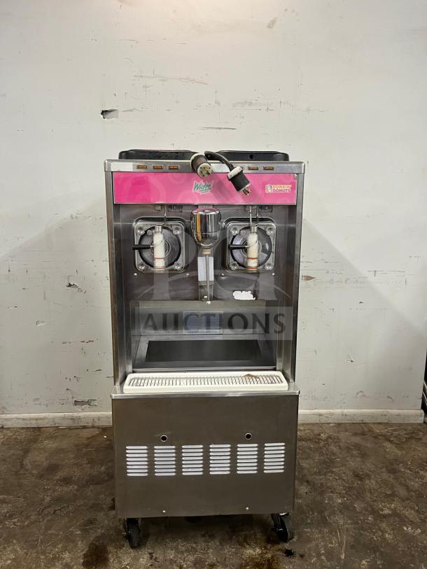 TAYLOR 342D Double Flavor Frozen Drink Machine, stainless steel, visible Dunkin' Donuts branding, on wheels, used condition.