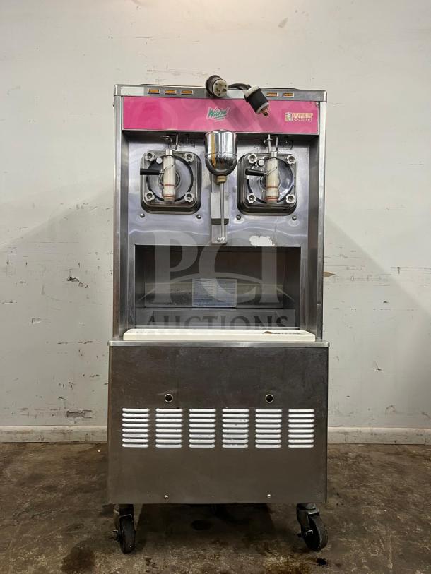 TAYLOR 342D Double Flavor Frozen Drink Machine, visible wear, stainless steel, pink branding, ideal for margaritas and milkshakes.