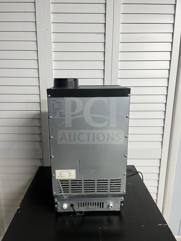 ROVSUN 13" 90 lbs air-cooled ice machine, model BT90, countertop black; features rear cooling vents; good condition.