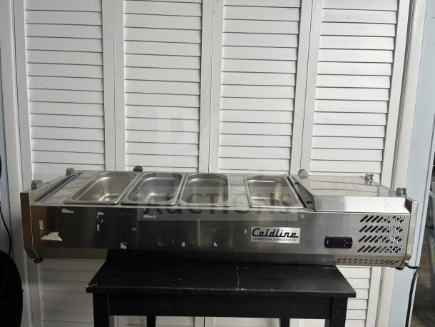 Coldline CTP60SS 60″ refrigerated stainless steel countertop salad bar with 6 pans, used condition, visible Coldline logo.