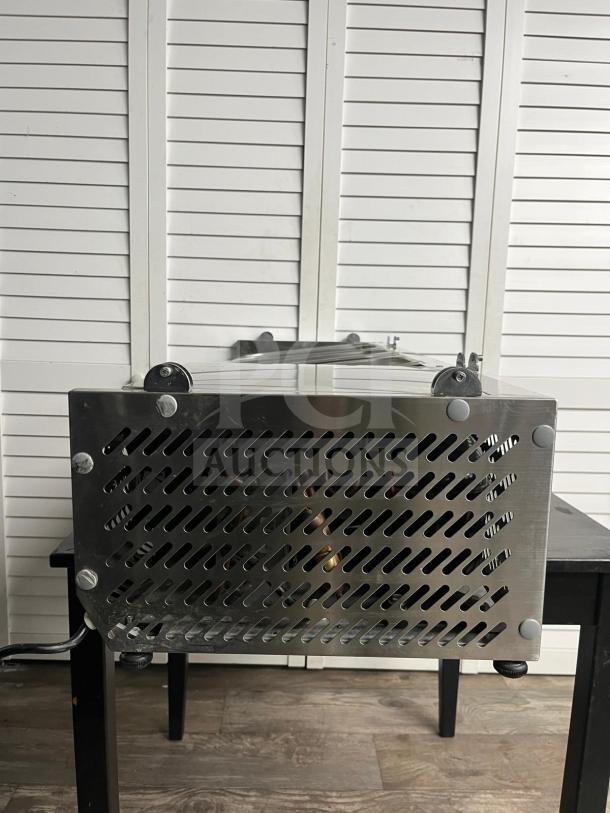 Coldline CTP60SS refrigerated salad bar, stainless steel, 60", accommodates 6 pans, top cover visible, used condition.