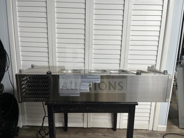 Coldline CTP60SS 60″ refrigerated salad bar with 6 pans, stainless steel top, and side labels detailing usage instructions.