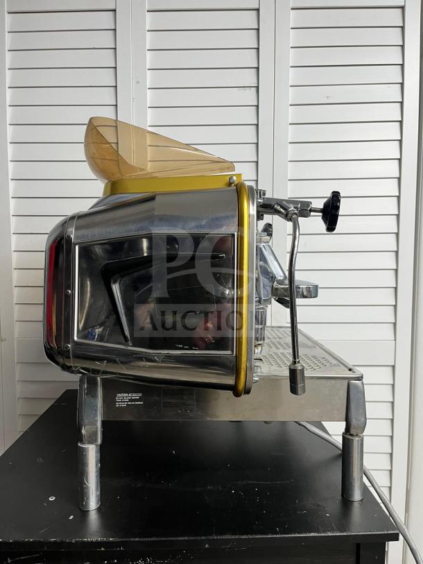 FAEMA E61 Legend semi-automatic espresso machine, 28-inch, excellent condition, chrome finish, side view.