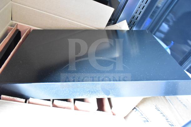 True TVM-48SL-HC glass door merchandiser, black narrow profile, new with scratch and dent. 115V, 1 Phase, LED lighting.