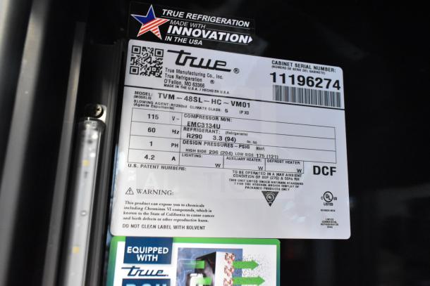 Brand new True TVM-48SL-HC commercial glass door merchandiser label, 115V, 1-Phase, with LED lighting, scratch and dent condition.