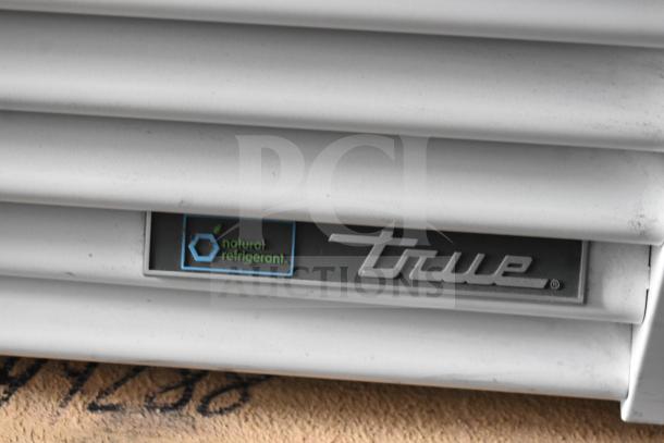 "True" cooler logo with "natural refrigerant" label on 2026 model TSCI-600R-G-PH single door reach-in cooler.