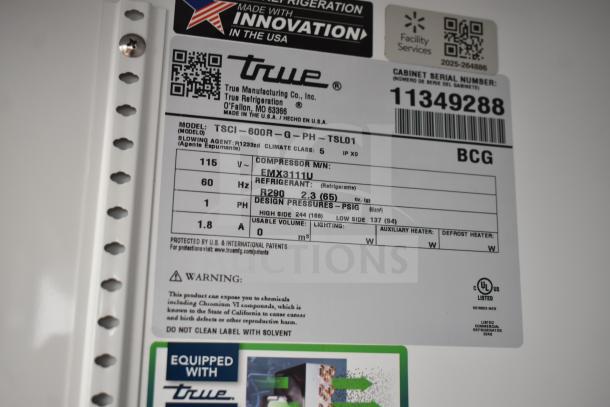 Label on True TSCI-600R-G-PH cooler, showing model, 115 volts, refrigerant details, and safety warnings.