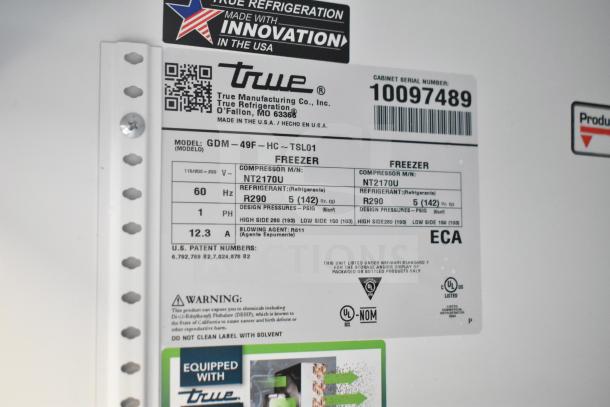 Label of True GDM-49F-HC Commercial Freezer. Displays model details, compressor info, refrigerant type R290, voltage, and certification marks.