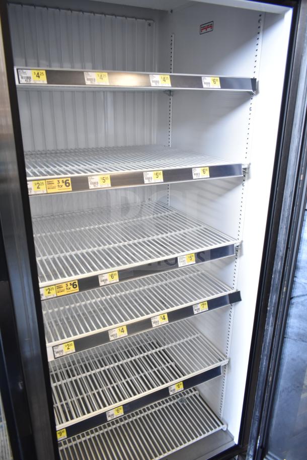 2021 True GDM-49F-HC Commercial 2 Door Freezer with multiple shelves. Clean interior, visible price labels, excellent condition.