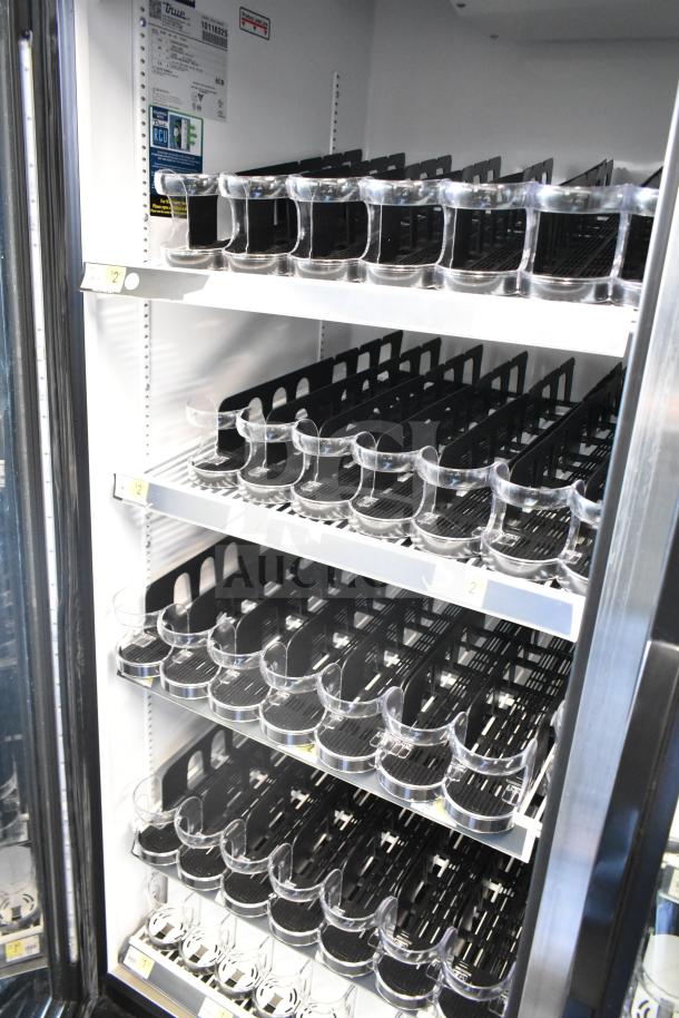 2021 True GDM-49-HC commercial two-door reach-in cooler with adjustable shelves and clear door, 115/208-230V, 1 Phase.