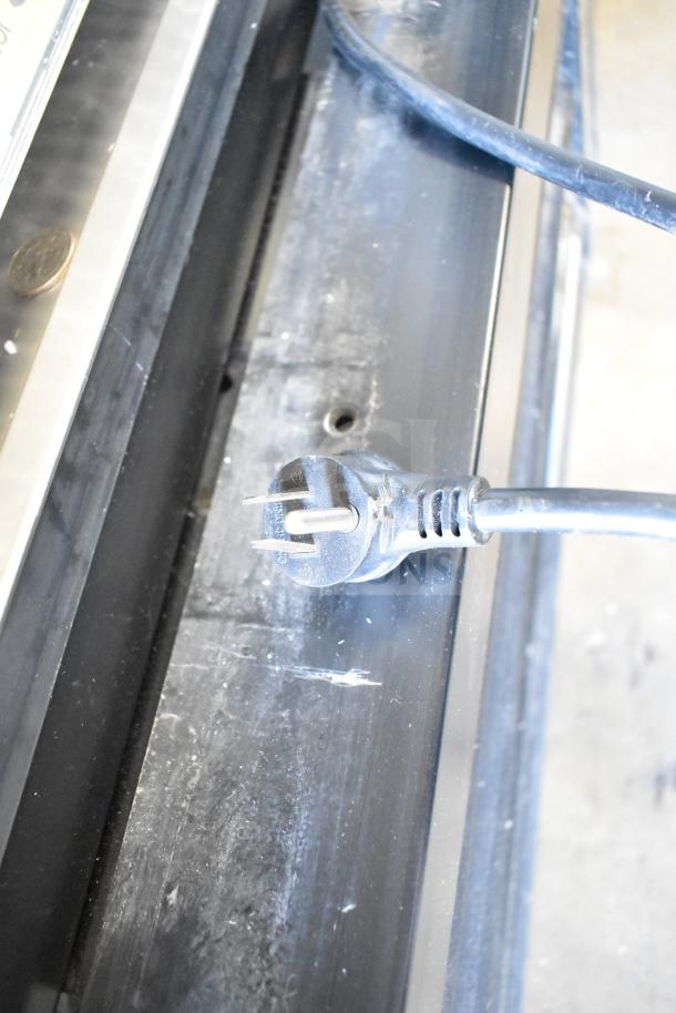 2021 True GDM-49-HC 2 Door Cooler power plug detail, 115/208-230V, 1 Phase, good condition, slight surface wear.