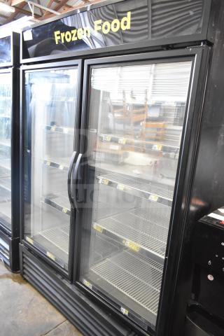 2016 True GDM-49F-HC Commercial Freezer, 2 glass doors, "Frozen Food" sign, stainless shelves, excellent condition.
