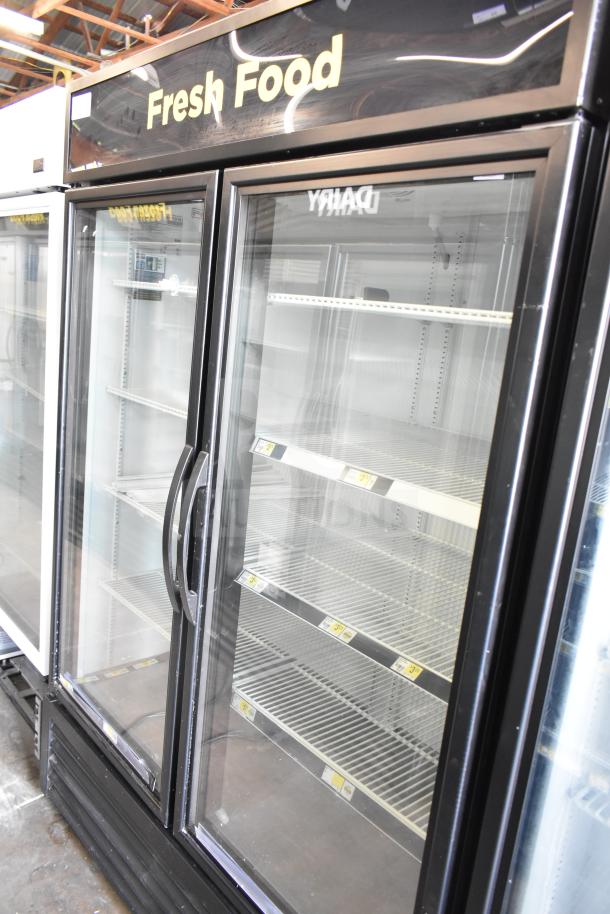 2021 True GDM-49-HC, 2-door commercial cooler, 115V, 1 phase, glass doors, labeled "Fresh Food", good condition.