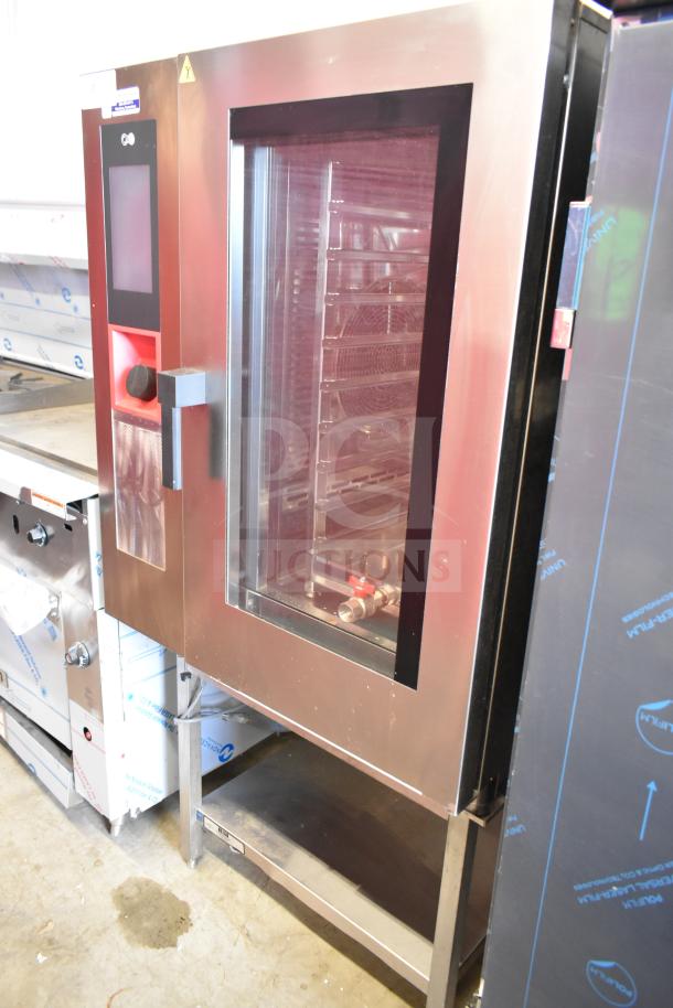 Bakers Pride AETG101R stainless steel commercial combi convection oven on stand, natural gas, sleek panel, excellent condition.