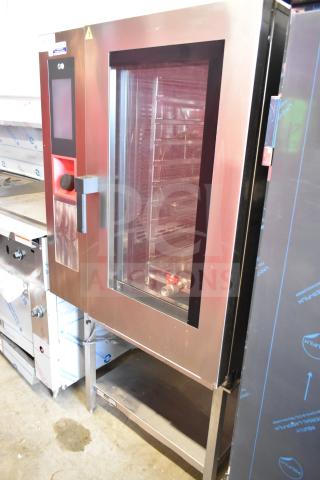 Bakers Pride AETG101R stainless steel commercial combi convection oven on stand, natural gas, sleek panel, excellent condition.