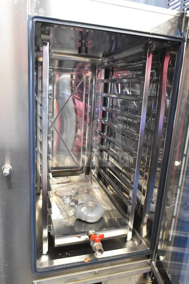 Bakers Pride AETG101R stainless steel commercial combi convection oven, natural gas, shown on equipment stand.