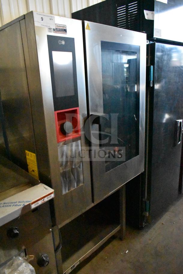 Bakers Pride AETG101R stainless steel combi convection oven, natural gas, on equipment stand, labeled controls visible.