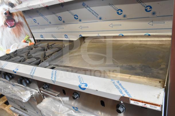 Brand new Vulcan 72" natural gas range, 6 burners, 36" griddle, 2 ovens, 310,000 BTU, scratch and dent condition.