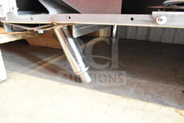 Close-up of the base and leg of a Vulcan 72SS-6B36GTN range. The metal leg shows slight wear.