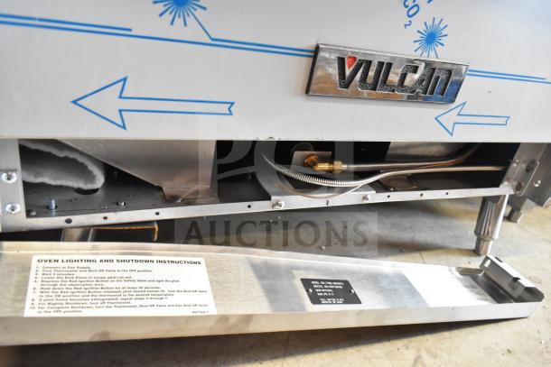 Brand new Vulcan 72SS-6B36GTN range, 6 burners, 36" griddle, 2 ovens, natural gas, 310,000 BTU, thermostat, instructions visible.