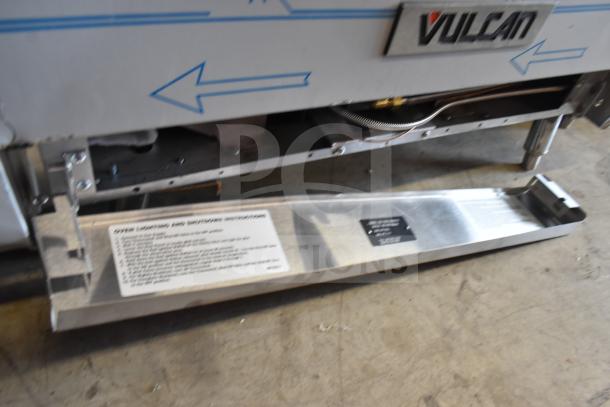 Brand new Vulcan 72SS-6B36GTN range, 6 burners, 36" griddle, 2 ovens, natural gas, 310,000 BTU, slight scratches.