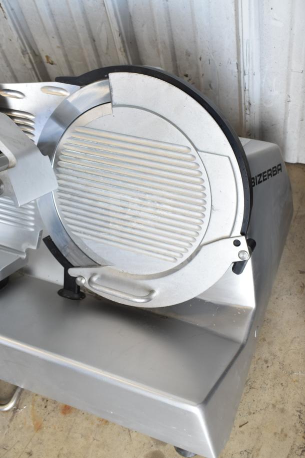 2023 Bizerba GSP H Commercial Meat Slicer with blade sharpener, 120V, 1 Phase. Features durable metal construction.