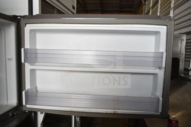 2018 Whirlpool WRT511SZDM00 Reach In Cooler with Freezer, open door view showing interior shelves. 115V, 1 Phase.