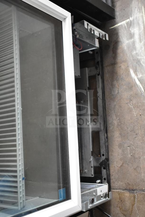 2021 True TSCI-600R-G-PH Commercial Cooler, single door, reach-in design, 115 volts, 1 phase, visible shelving.