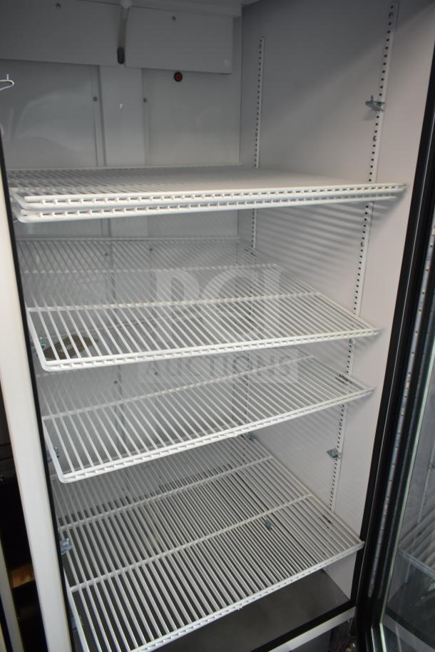 2021 True TSCI-600R-G-PH commercial single door reach-in cooler, glass door, metal shelves, 115V, 1 phase, excellent condition.