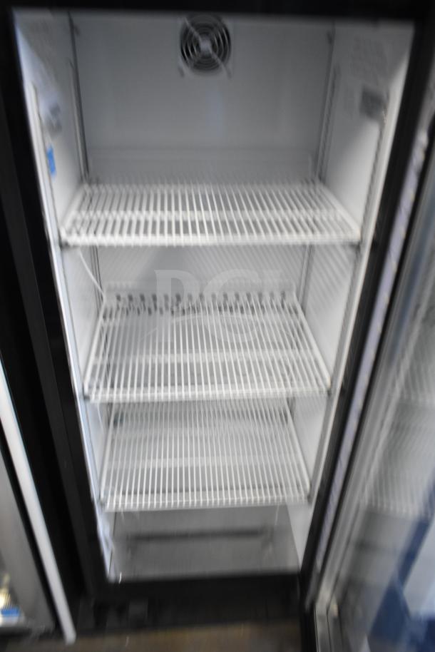 IDW G4-H0234B single door reach-in cooler merchandiser, white shelves, good condition, 110-120 volts, 1 phase.