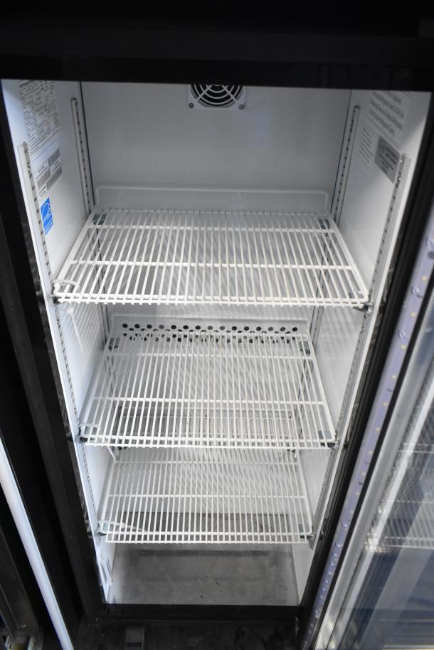 IDW G4-H0234B Single Door Cooler, 110-120V, new condition, three adjustable shelves. Model label visible inside.