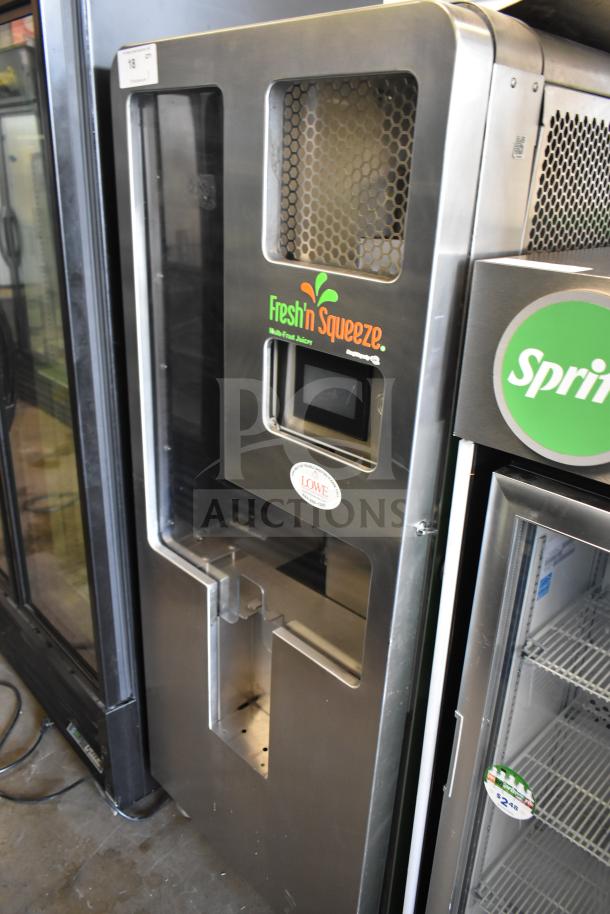 LATE MODEL JBT 2ND-GEN-MFJ-HE Fresh N Squeeze citrus juicer on casters, 115V, 1-phase, commercial use, stainless steel.