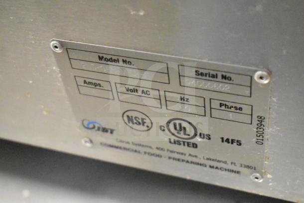 JBT 2ND-GEN-MFJ-HE citrus juicer label showing model, serial number, and UL certification on metal surface.