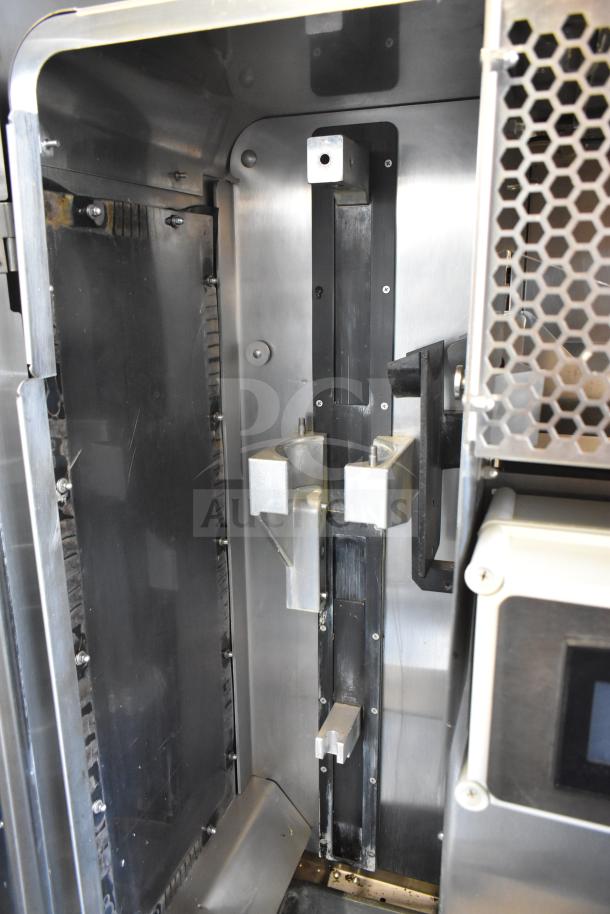 JBT 2ND-GEN-MFJ-HE commercial citrus juicer interior, stainless steel, floor style, on casters, 115V, 1 phase.