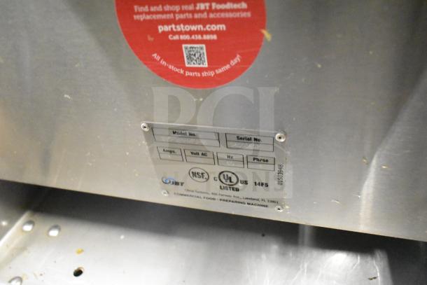 Alt text: JBT 2ND-GEN-MFJ-HE Citrus Juicer label showing model, serial number, and NSF, UL certifications.