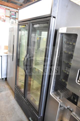 2021 True GDM-35F-HC commercial cooler with 2 glass doors, 115V, 1-phase, showcases interior shelving, optimal for merchandising.