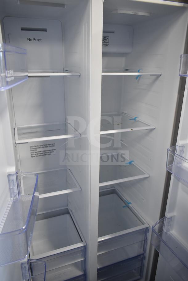 Hamilton Beach HBF1558, 15.6 cu ft counter-depth refrigerator. Features include No Frost and LED light. Clean interior.