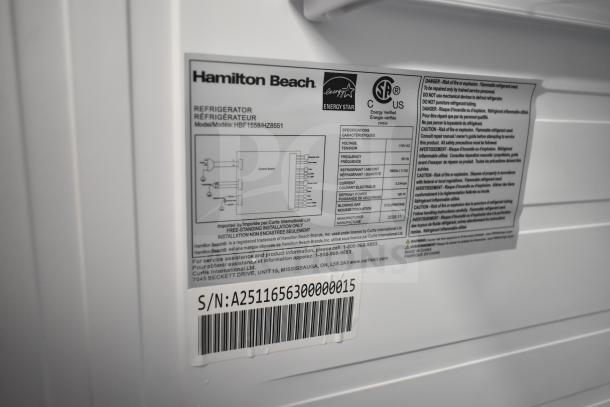 Hamilton Beach HBF1558 refrigerator label showing model details, voltage 115V, 1 phase, Energy Star rating, and serial number.