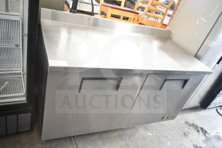 2016 True TWT-60F commercial 2-door work top freezer on casters, stainless steel, 115 volts, excellent condition.