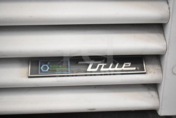 2021 True TSCI-600R-G-PH cooler merchandiser with natural refrigerant label, 115V, single door.