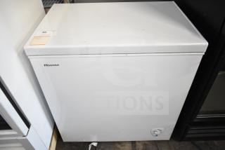 Hisense WFC070MSRWD chest freezer, white, 115 volts, 1 phase. Visible control knob. Used condition with minor surface marks.