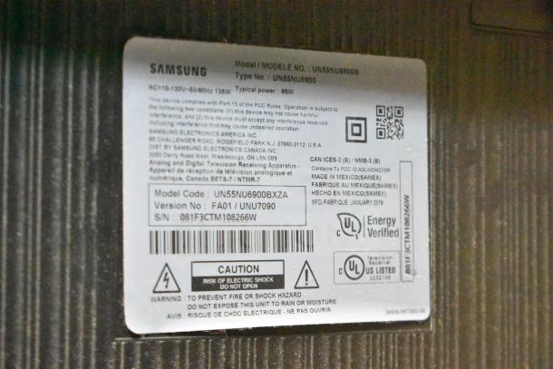 Label on Samsung UN55NU6900B TV; model code UN55NU6900BXZA, version FA01/UNU7090, UL Energy Verified.