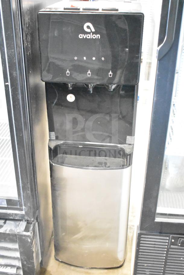 Avalon A4BLWTRCLR water cooler, 115 volts, black and silver finish, with three dispensers, branded on top panel.