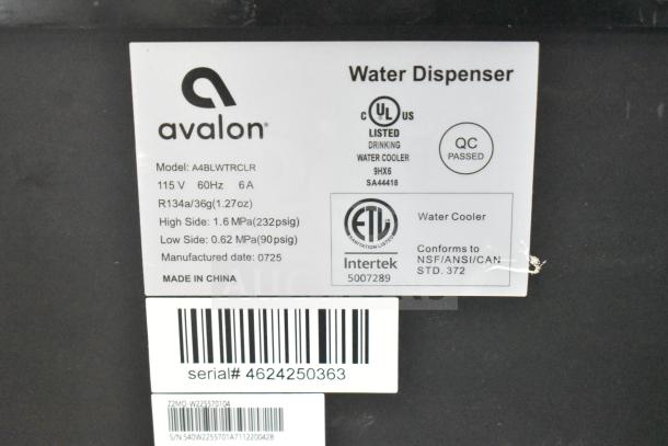 Avalon A4BLWTRCLR Water Cooler label with model and serial numbers, voltage, and QC passed marking.