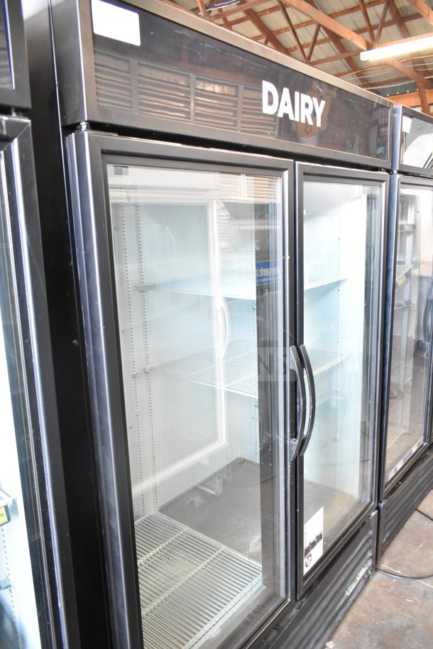2019 True GDM-49-HC 2 Door Reach-In Freezer Merchandiser, 115 Volts, 1 Phase, clean interior, glass doors, "Dairy" signage.