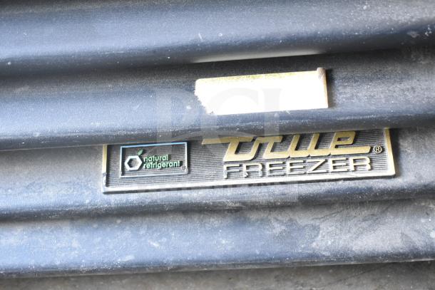 2016 True GDM-49-HC Cooler tag showing "Natural Refrigerant" and "True Freezer" markings, 115V, 1-Phase.