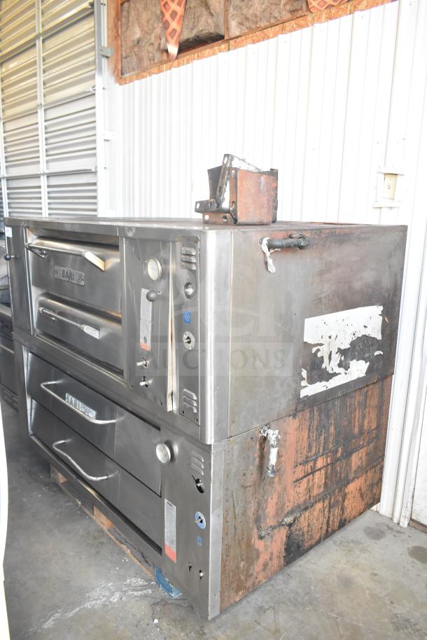 Bari M354 commercial natural gas single deck pizza ovens, stainless steel, used condition with visible wear and branding plates.