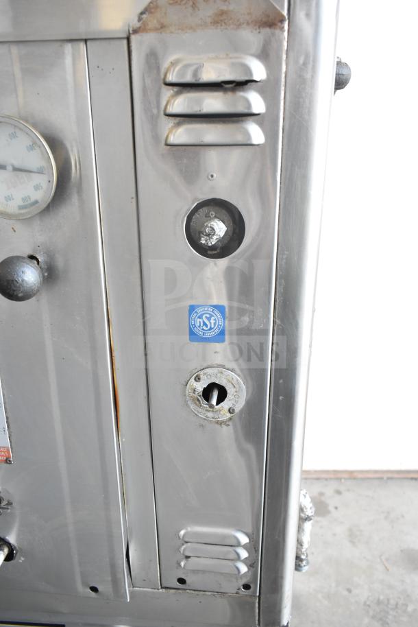 Front panel of a Bari M354 commercial natural gas pizza oven with control knobs and NSF certification label.