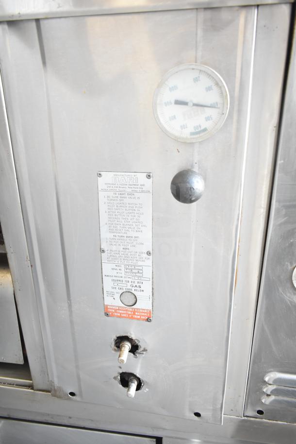 Bari M354 commercial natural gas pizza oven, single deck, stainless steel, thermostat gauge, usage instructions visible.